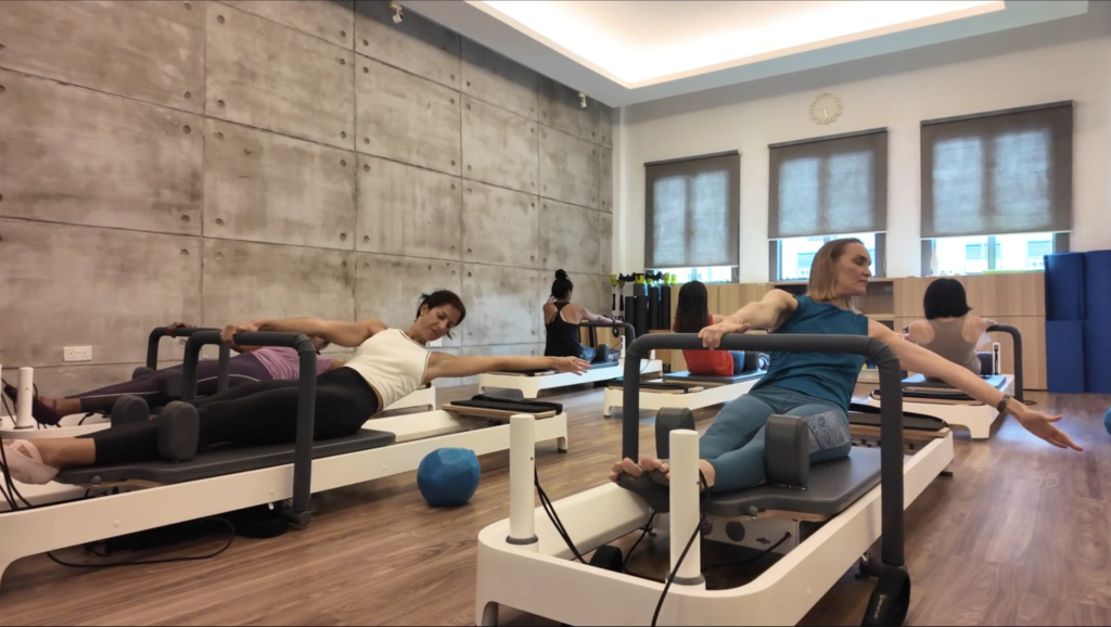 Reformer Pilates group class at The Moving Body @ East Coast
